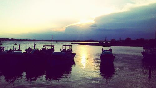 Scenic view of calm sea at sunset