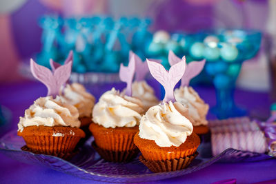 Close-up of cupcakes on table