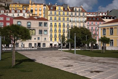 Buildings in city against sky