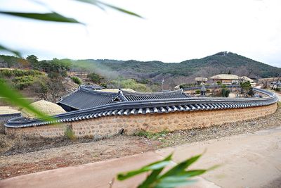 Scenic view of residential district against sky