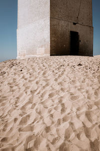 Shadow of building on beach