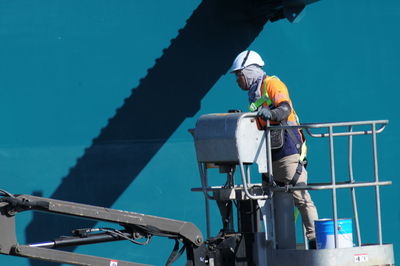 Man working on boat