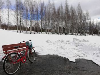 Bicycle on snow covered field