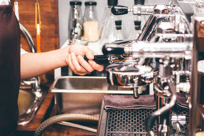 Man working with coffee in cafe