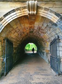 Woman walking in corridor