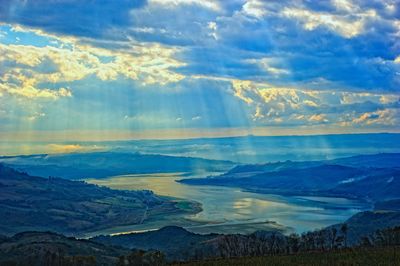 Scenic view of landscape against blue sky