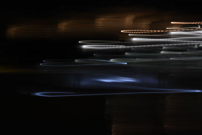 Close-up of illuminated lights on table