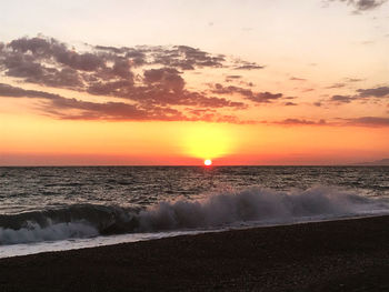 Scenic view of sea against sky during sunset