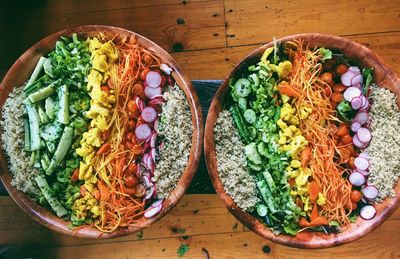 High angle view of chopped vegetables in bowl on table