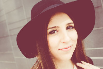 Close-up portrait of a smiling young woman