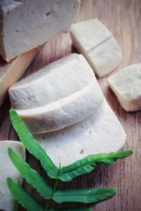 High angle view of bread on cutting board