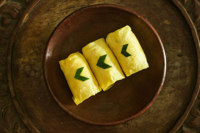 High angle view of bread in bowl on table