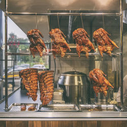 Close-up of meat on barbecue grill