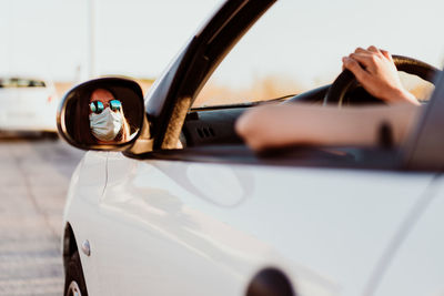 Woman sitting in car