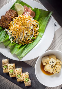 High angle view of food served on table