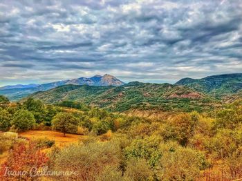 View of landscape against cloudy sky