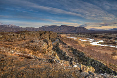 View of landscape against cloudy sky