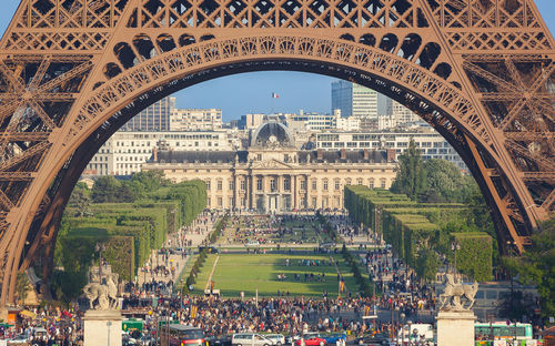 People walking in front of eiffel tower