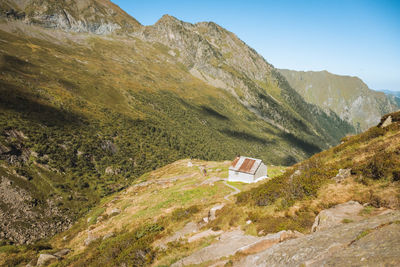 A scenic view of a mountain cabin in the pyrenees.