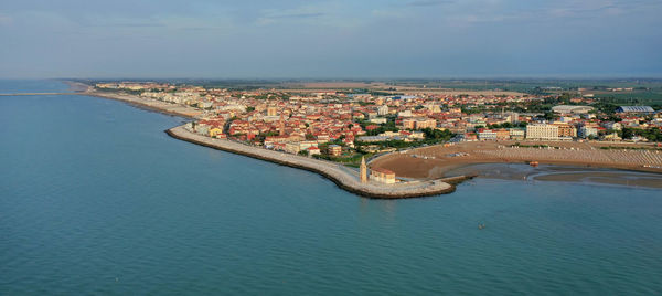 Caorle - panoramic view of the city from above the sea and the madonna dell'angelo sanctuary
