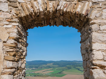 View of old ruins against blue sky