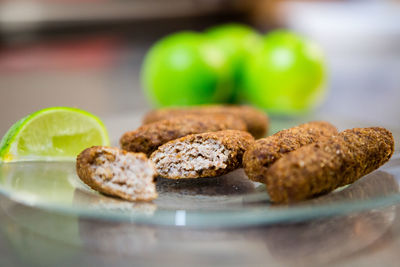 Close-up of bread in plate on table