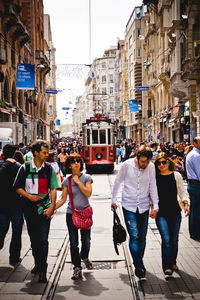 People walking on city street