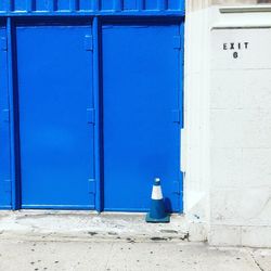 Closed blue door of building