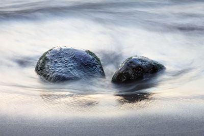 Scenic view of rocks in sea