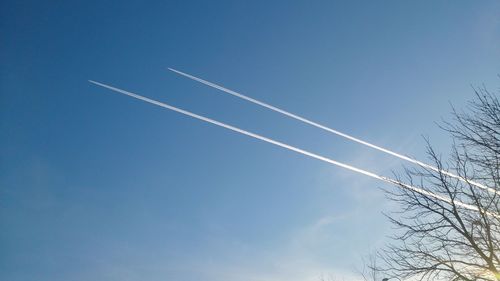 Low angle view of vapor trail in sky