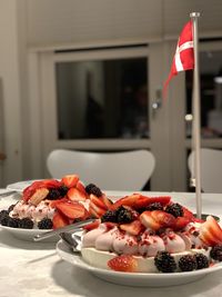 Close-up of fruits in plate on table