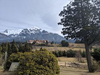 Scenic view of landscape and mountains against sky
