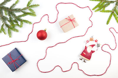 High angle view of christmas decoration against white background