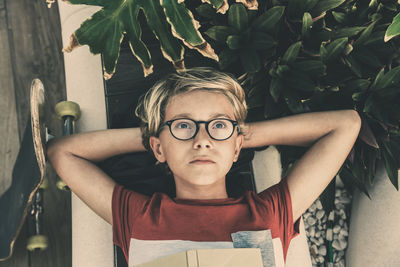 High angle view of boy lying down