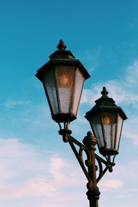 Low angle view of street light against sky