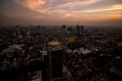 High angle view of cityscape against sky during sunset