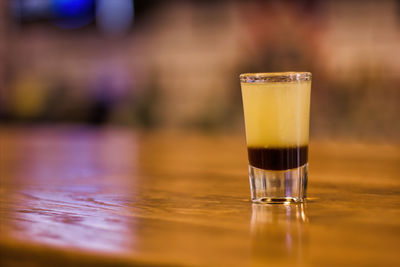 Close-up of beer glass on table