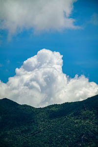 Low angle view of land against sky