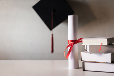 Close-up of red box on white table