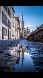 Reflection of mosque in city