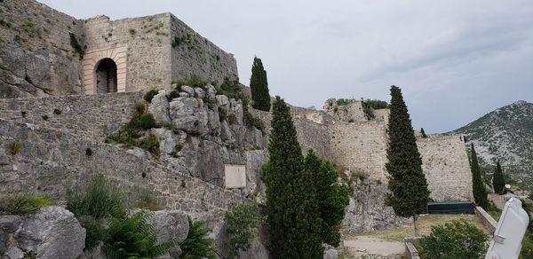 Low angle view of historical building against sky