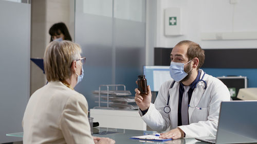 Female doctor working in laboratory