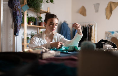People sitting on table at home