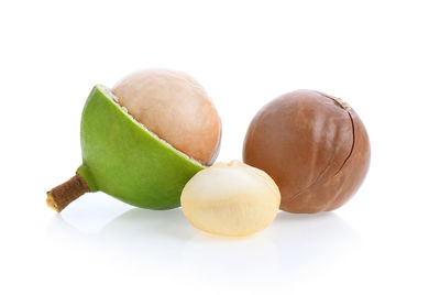 Close-up of fruits against white background