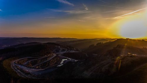 Aerial view of landscape during sunset