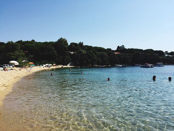 Scenic view of sea against clear blue sky