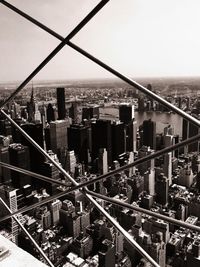 High angle view of buildings in city against sky