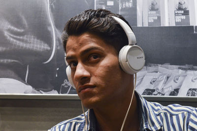 Portrait of young man looking away