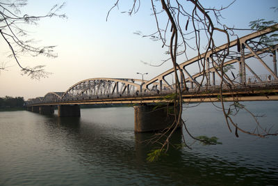 Bridge over river against sky