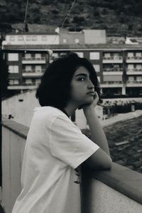 Portrait of young woman looking away